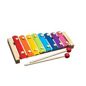 Colorful wooden xylophone with two mallets on a white background