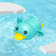 Load image into Gallery viewer, Toy duck floating in a pool with ripples around it