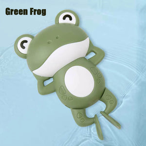 Green frog-shaped toy on a light blue background