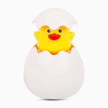 Load image into Gallery viewer, Yellow rubber duckling peeking out of a white egg on a white background