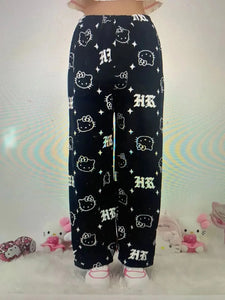 Black pants with white patterns on a white background