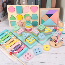 Load image into Gallery viewer, Assorted colorful wooden toys on a wooden surface with books in the background