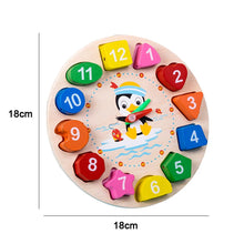 Load image into Gallery viewer, Wooden educational clock with colorful numbers and shapes, featuring a penguin illustration.